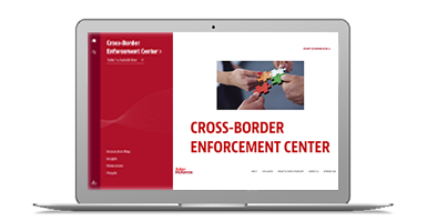 Laptop showing Cross-Border Enforcement site