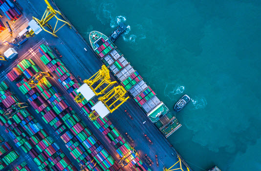 bird's eye view of shipyard with storage containers