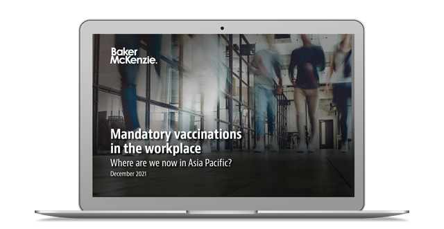 Mandatory Vaccinations in the Workplace Report on laptop screen