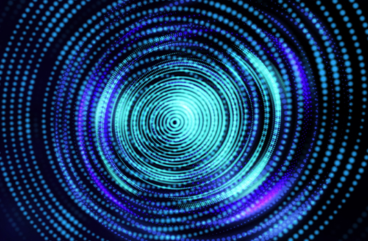 blue teal purple dots forming an abstract spiral shape