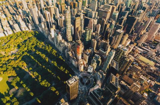 Aerial view of town with buildings and greenery